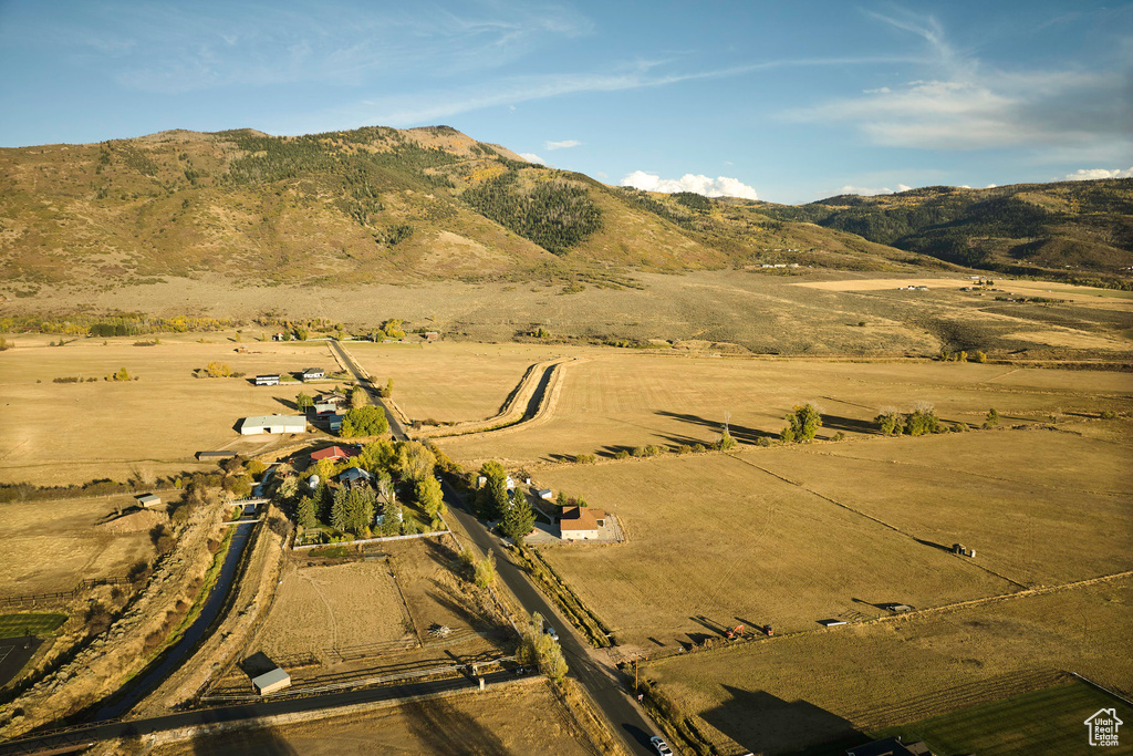 Property view of mountains with a rural view