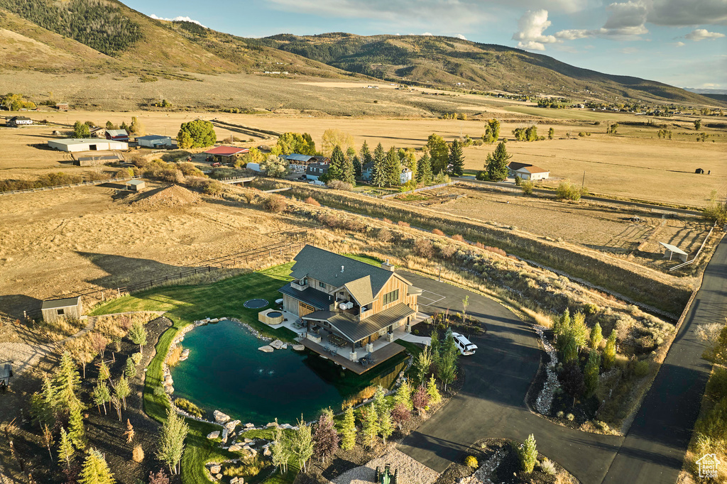 Aerial view featuring a mountain view and a rural view