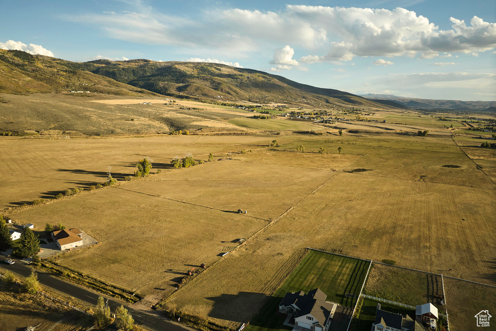 Drone / aerial view featuring a mountain view and a rural view