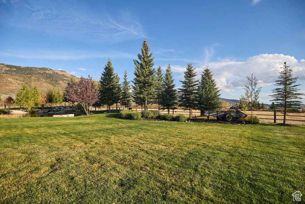 View of yard featuring a mountain view and a rural view