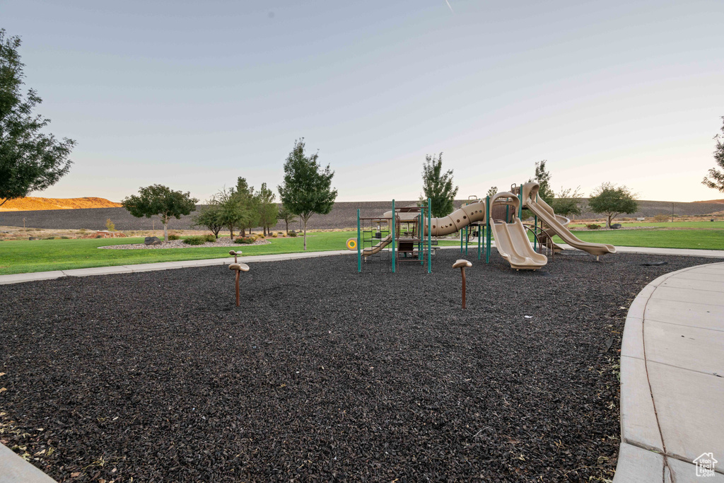 View of playground featuring a mountain view