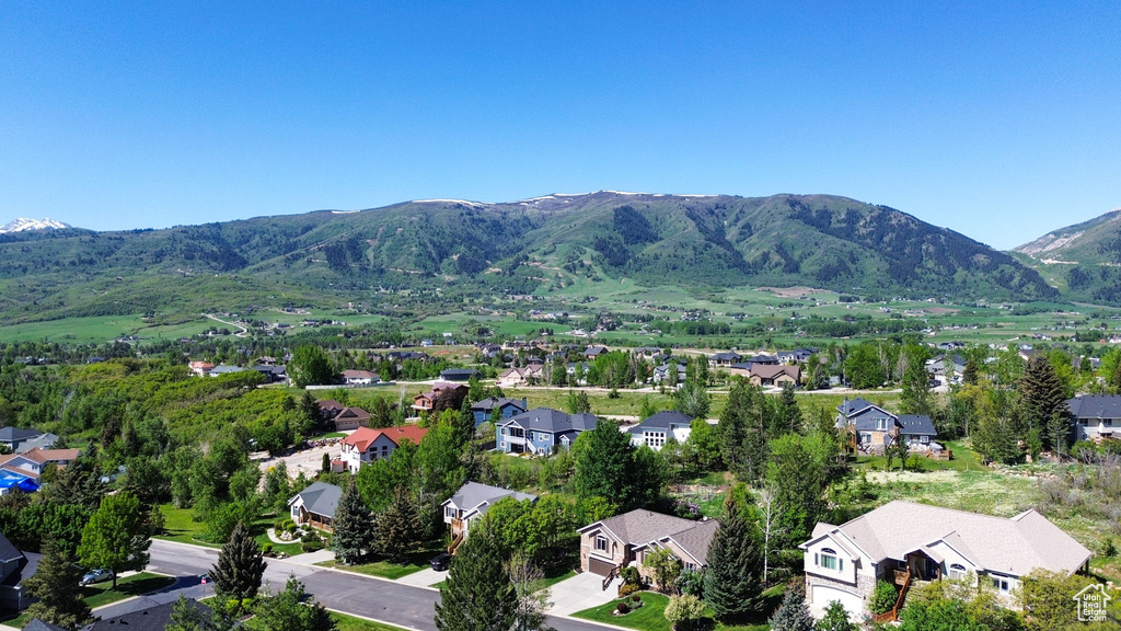 Aerial perspective of suburban area featuring mountains