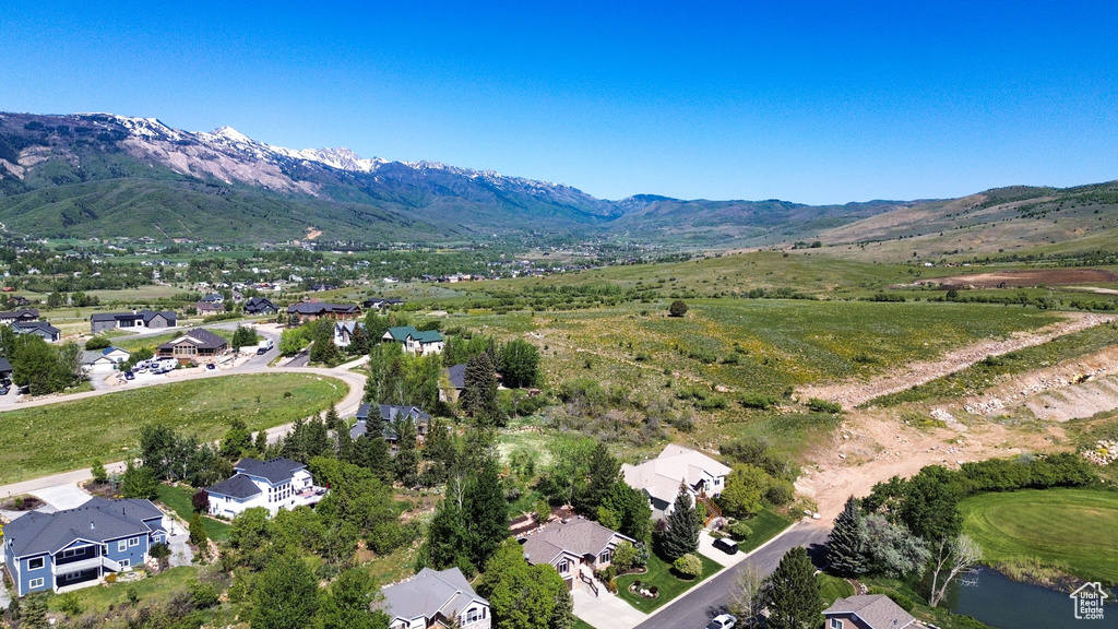 Aerial view of residential area with mountains