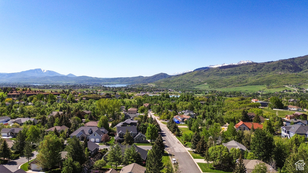 Aerial view of residential area with a mountainous background