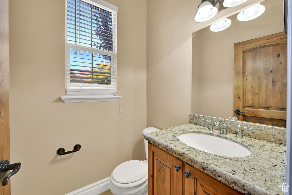 Bathroom featuring toilet and vanity