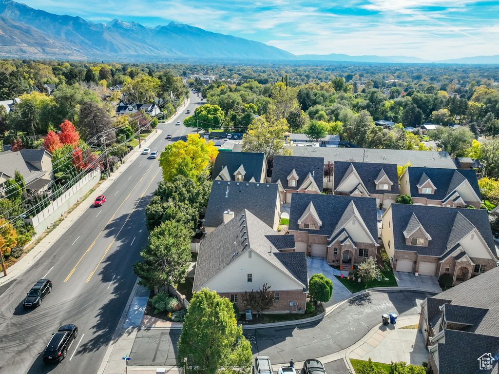 Birds eye view of property with a mountain view