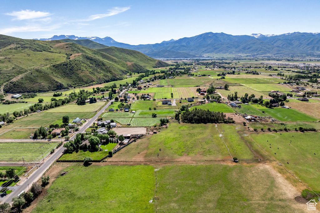 Birds eye view of property featuring a rural view and a mountain view