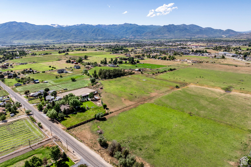 Aerial view featuring a rural view and a mountain view