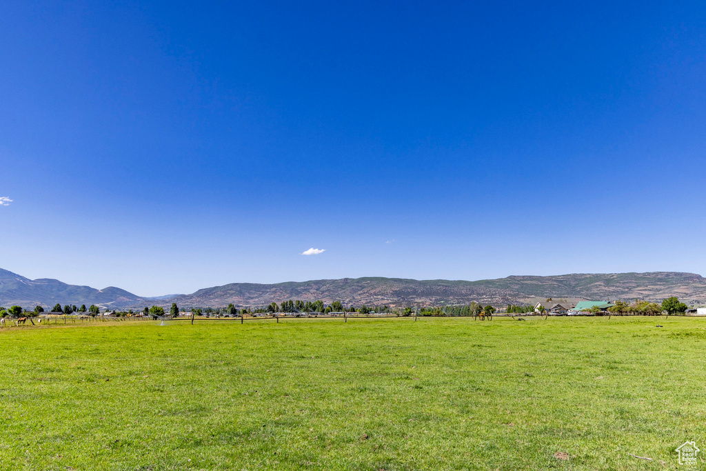 Property view of mountains featuring a rural view