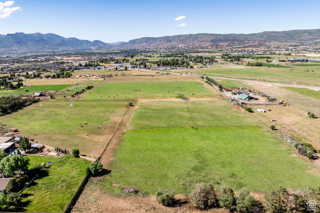 Drone / aerial view with a mountain view and a rural view