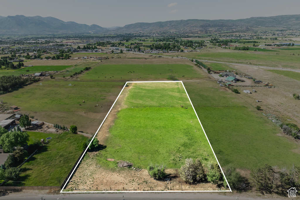 Drone / aerial view featuring a rural view and a mountain view