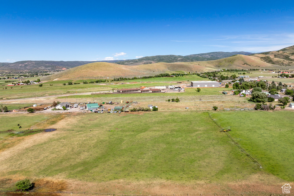 Birds eye view of property featuring a mountain view and a rural view