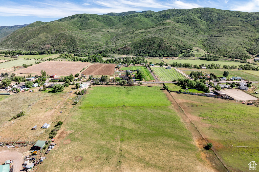 Birds eye view of property featuring a mountain view and a rural view