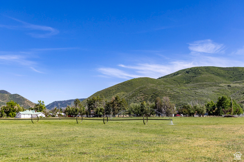 Property view of mountains featuring a rural view