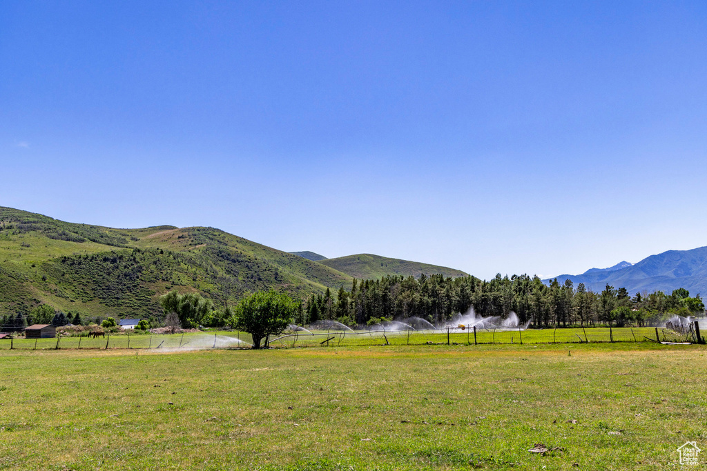 View of mountain feature with a rural view