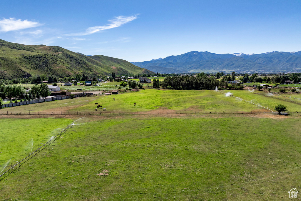 Property view of mountains featuring a rural view