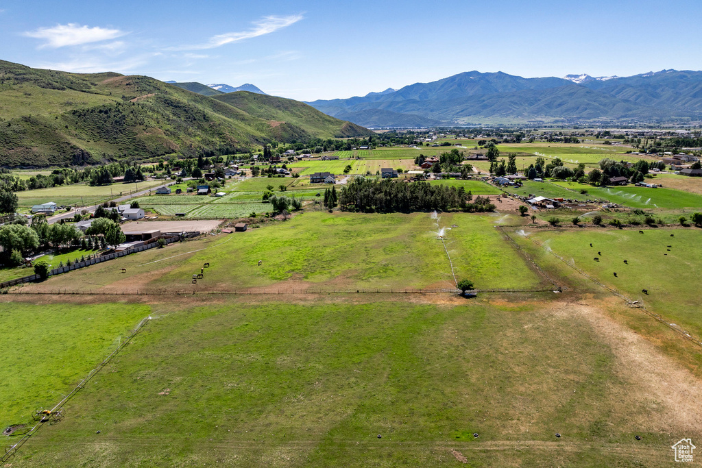 Property view of mountains with a rural view