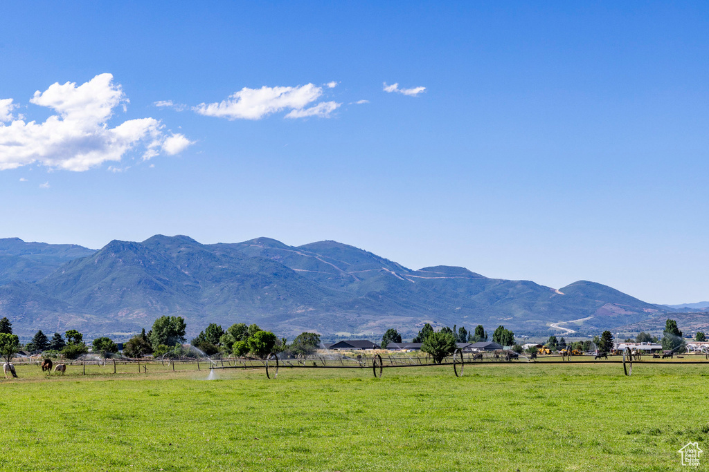 Property view of mountains featuring a rural view