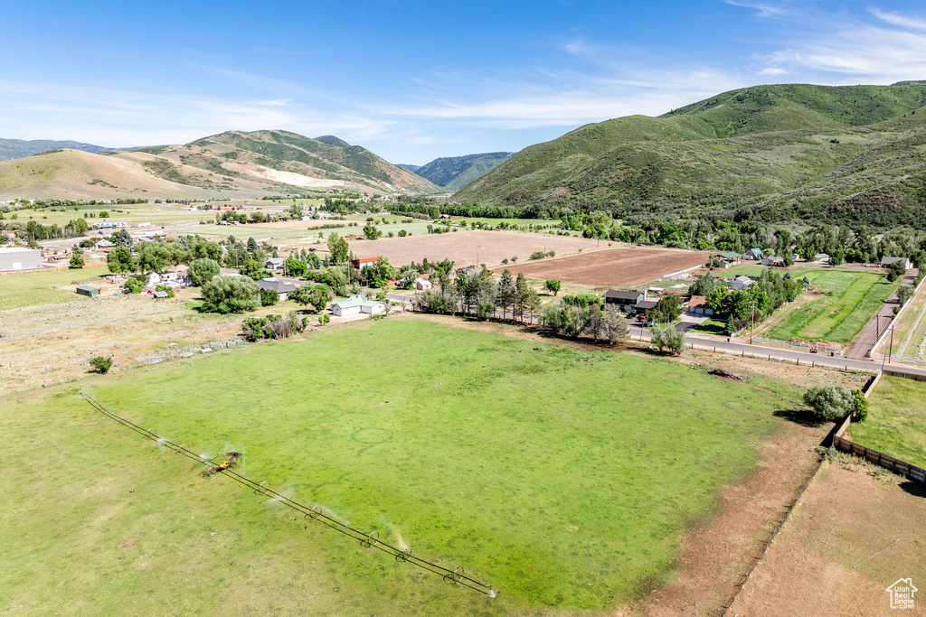 Aerial view featuring a rural view and a mountain view