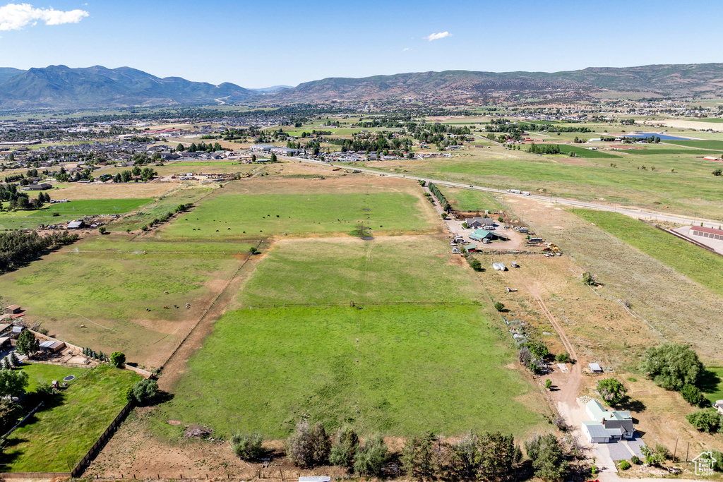 Drone / aerial view featuring a mountain view and a rural view