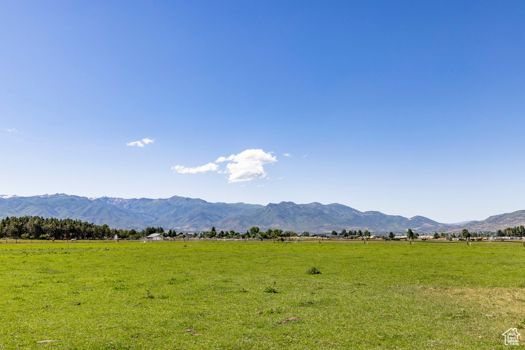 Property view of mountains featuring a rural view