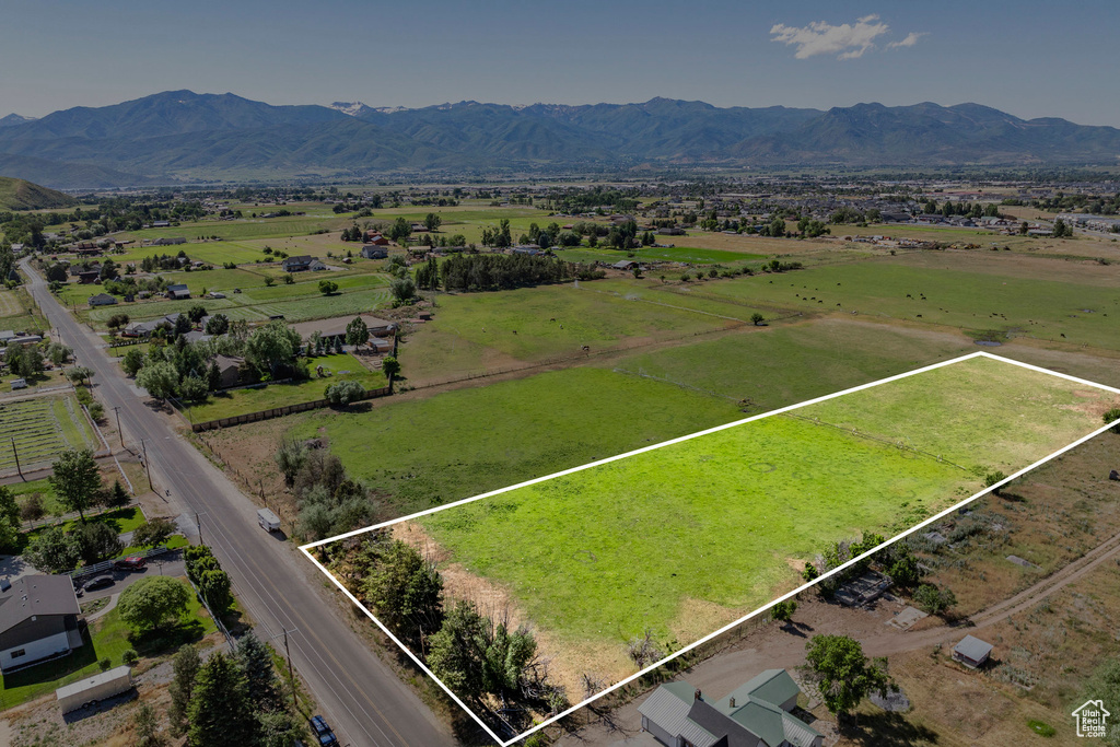 Aerial view with a rural view and a mountain view