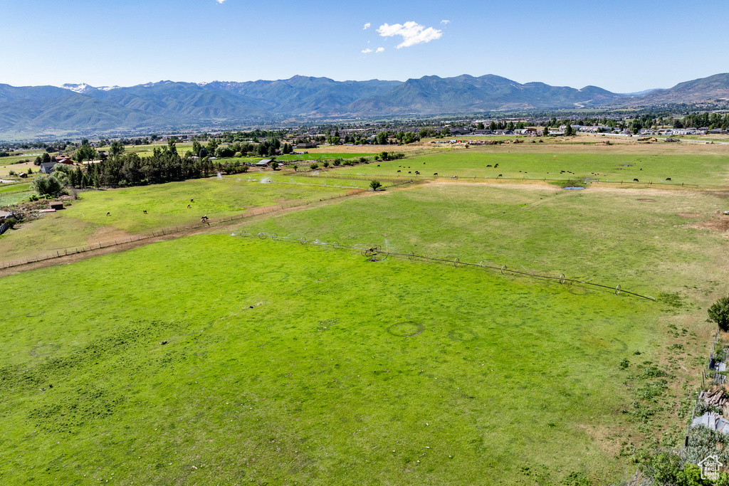 Property view of mountains with a rural view