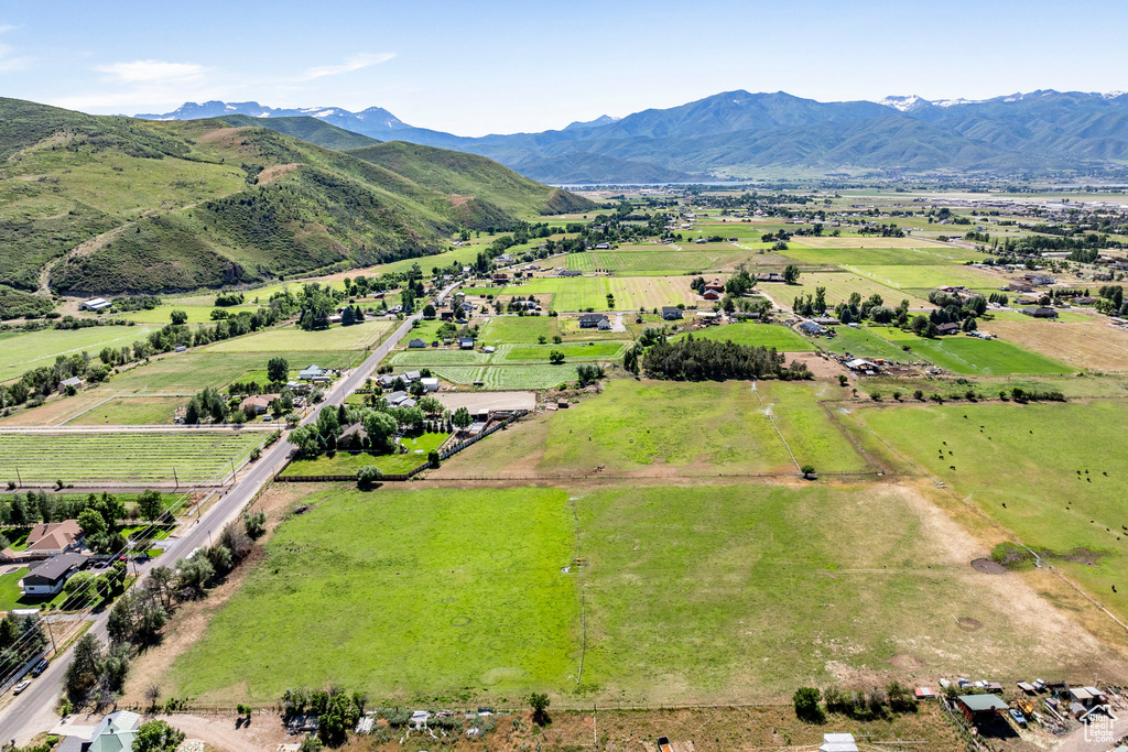 Birds eye view of property featuring a rural view and a mountain view