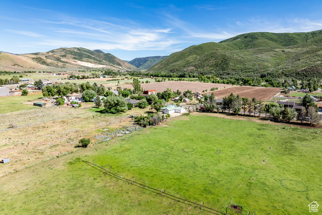 Property view of mountains with a rural view