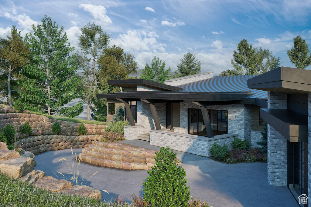 View of front of home featuring a patio area