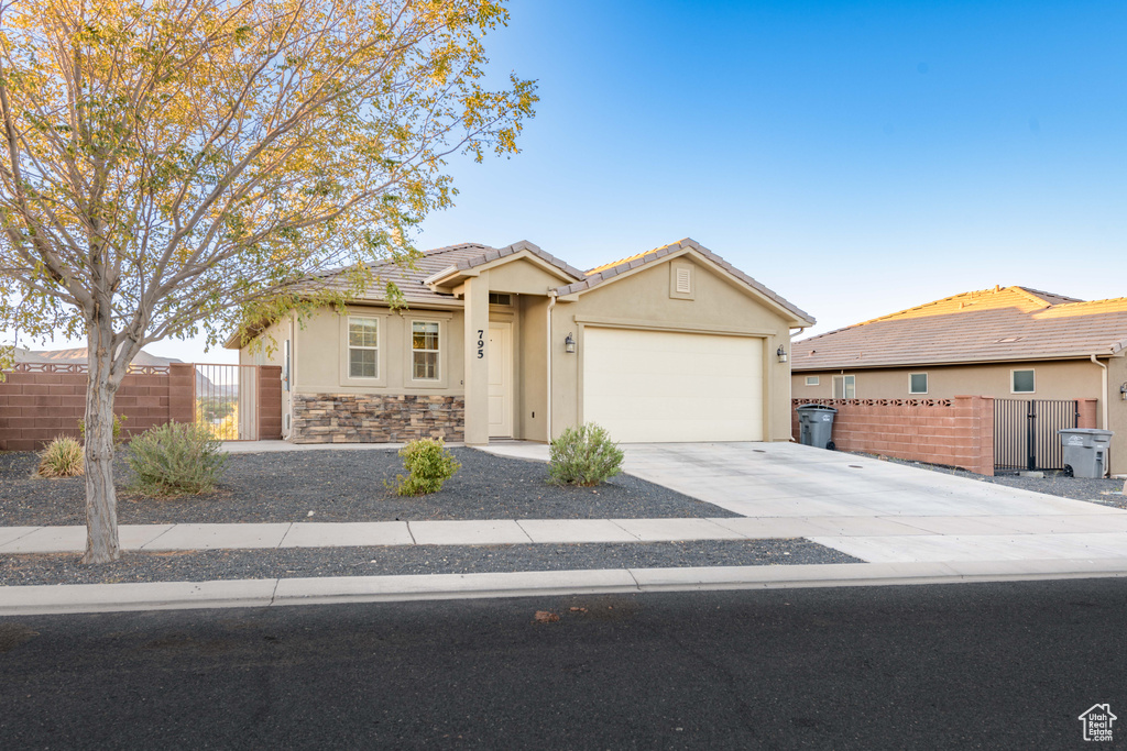 View of front of house with a garage