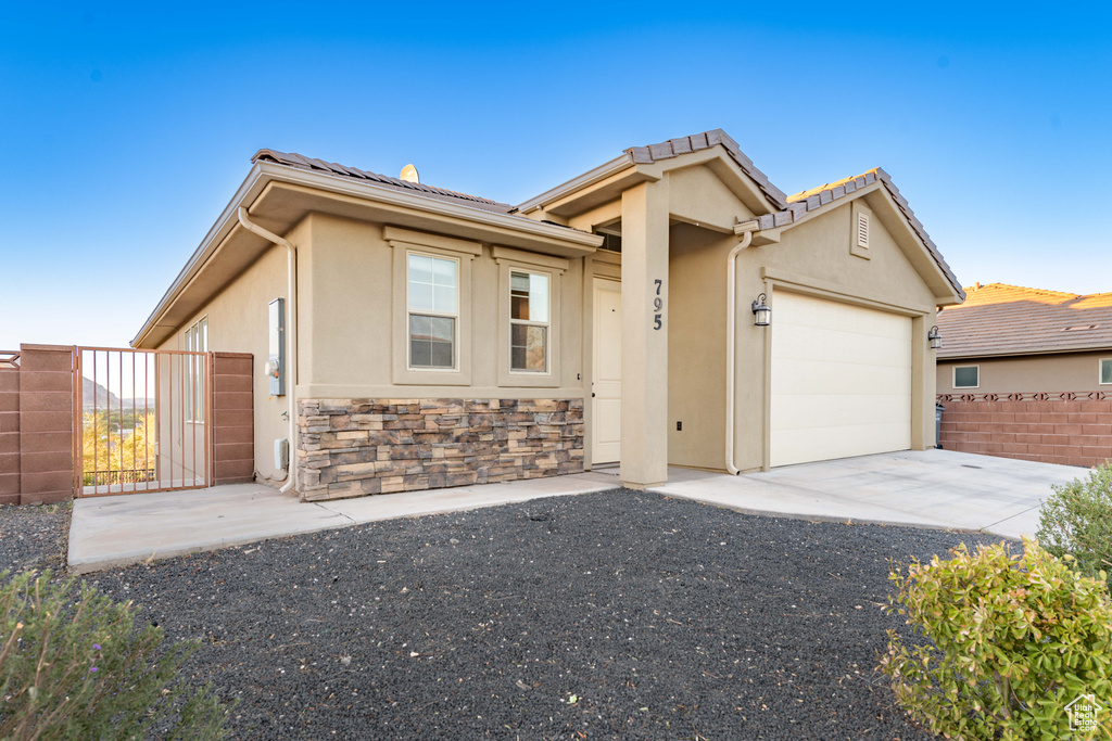 View of front of home with a garage