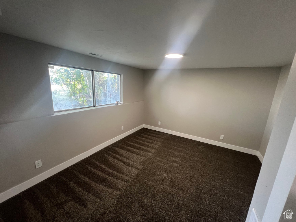 View of carpeted spare room