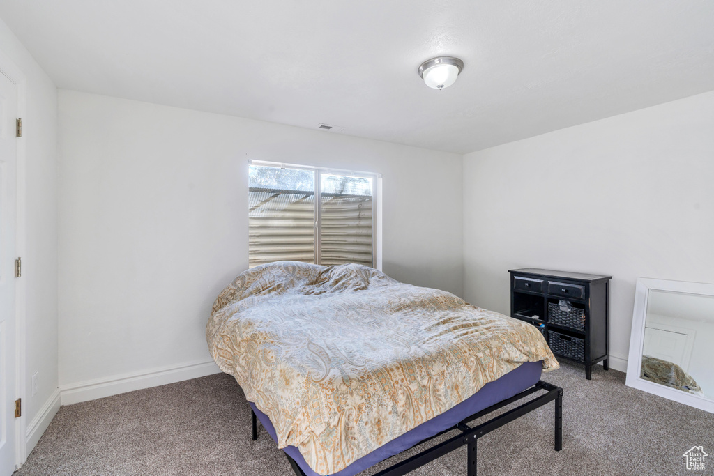 Bedroom with carpet floors