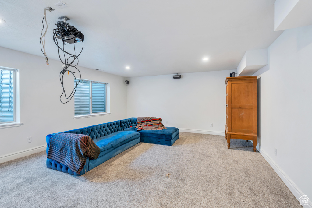 Living room featuring light colored carpet