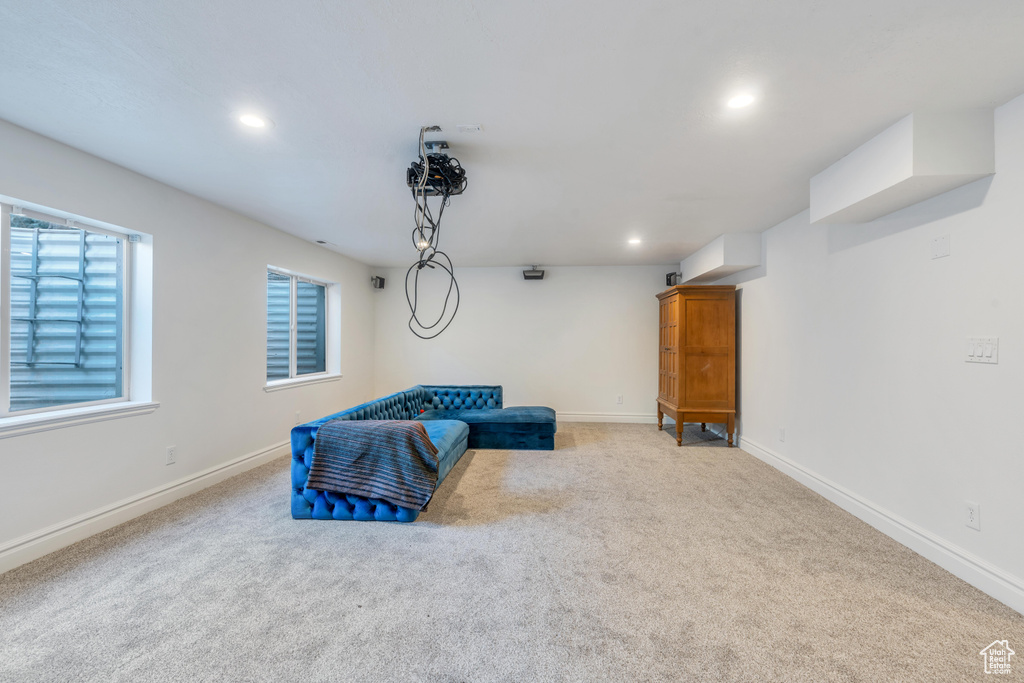 Living area with light colored carpet