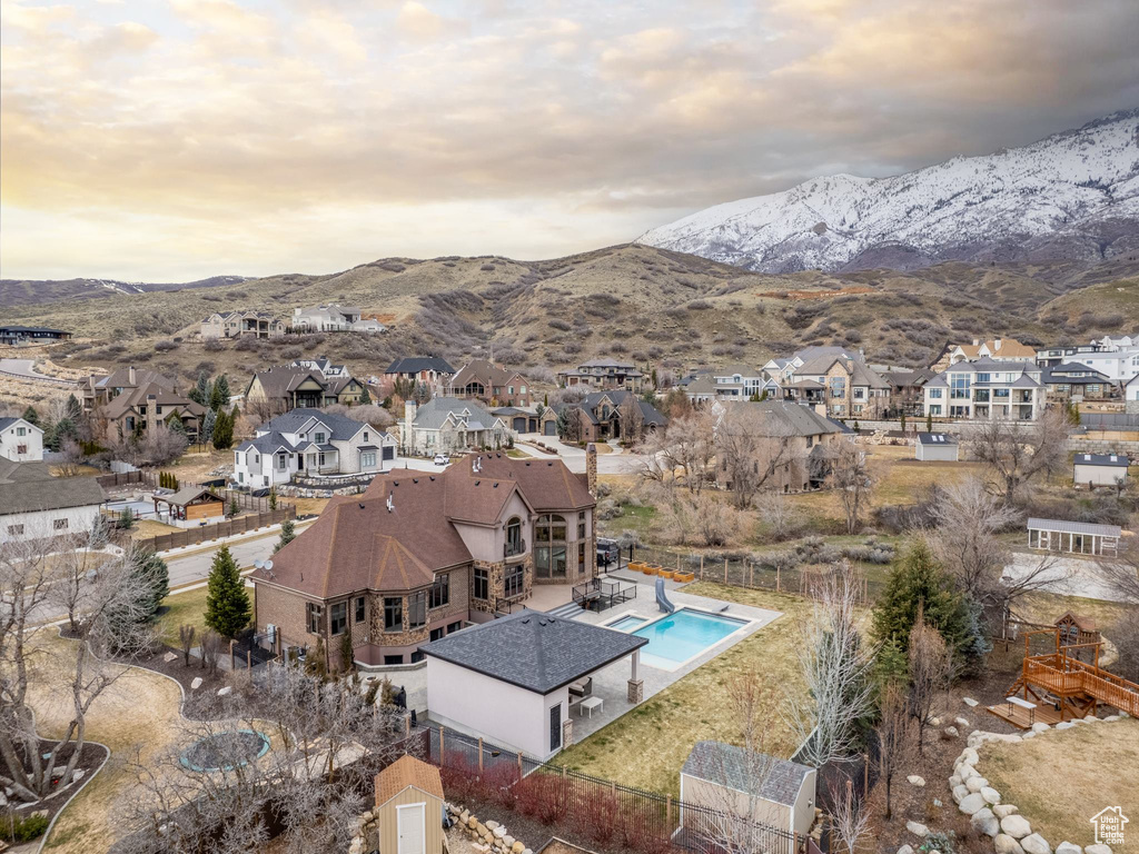 Aerial view at dusk with a mountain view