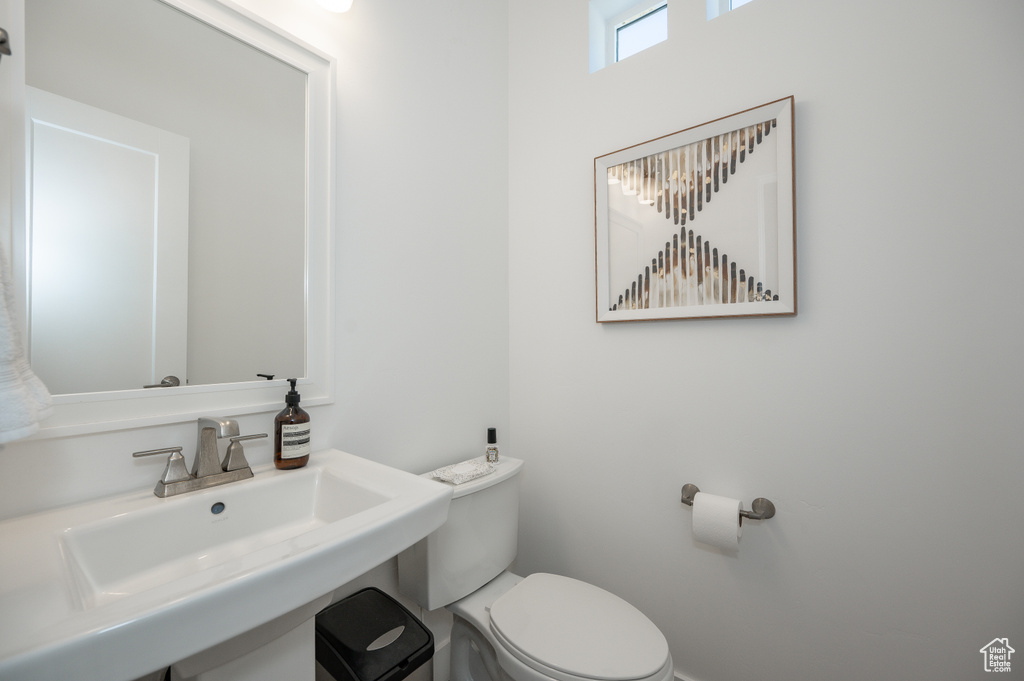 Bathroom with toilet and sink