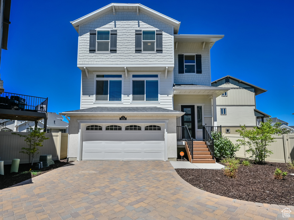 View of front of home with a garage