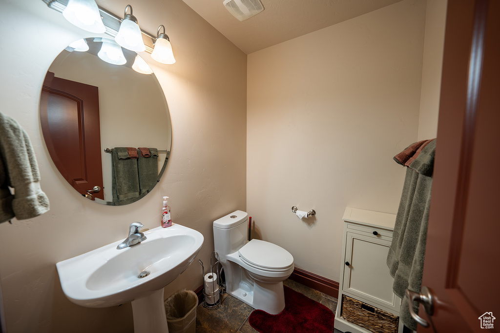 Bathroom with sink and toilet