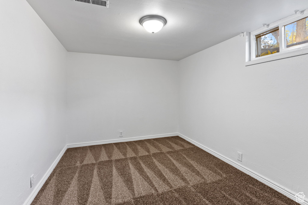 View of carpeted spare room