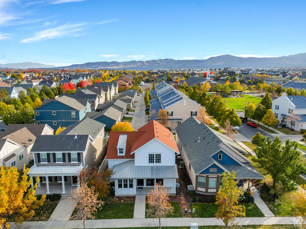 Birds eye view of property featuring a mountain view and a residential view