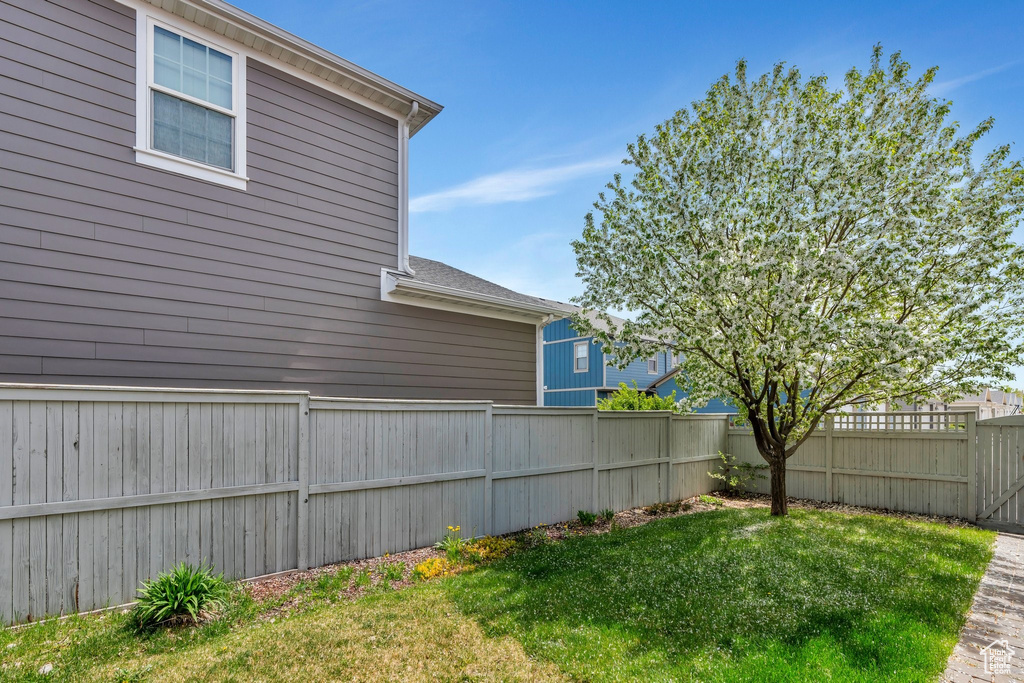View of yard with a fenced backyard