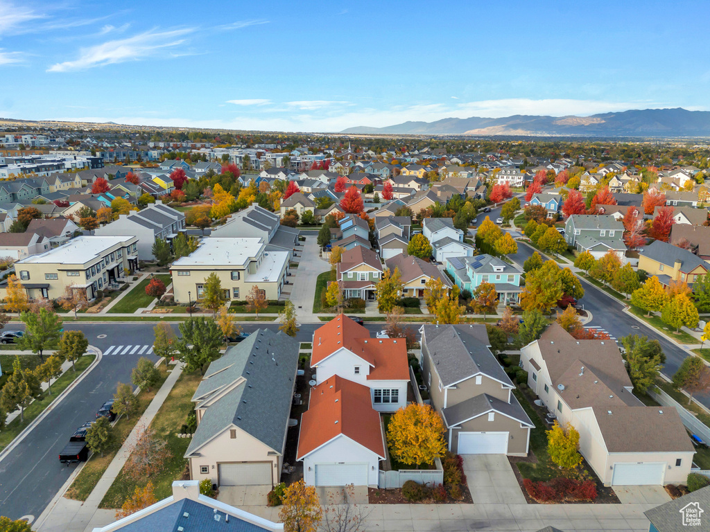 Drone / aerial view featuring a mountain view and a residential view