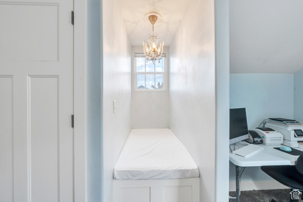 Bathroom featuring a notable chandelier