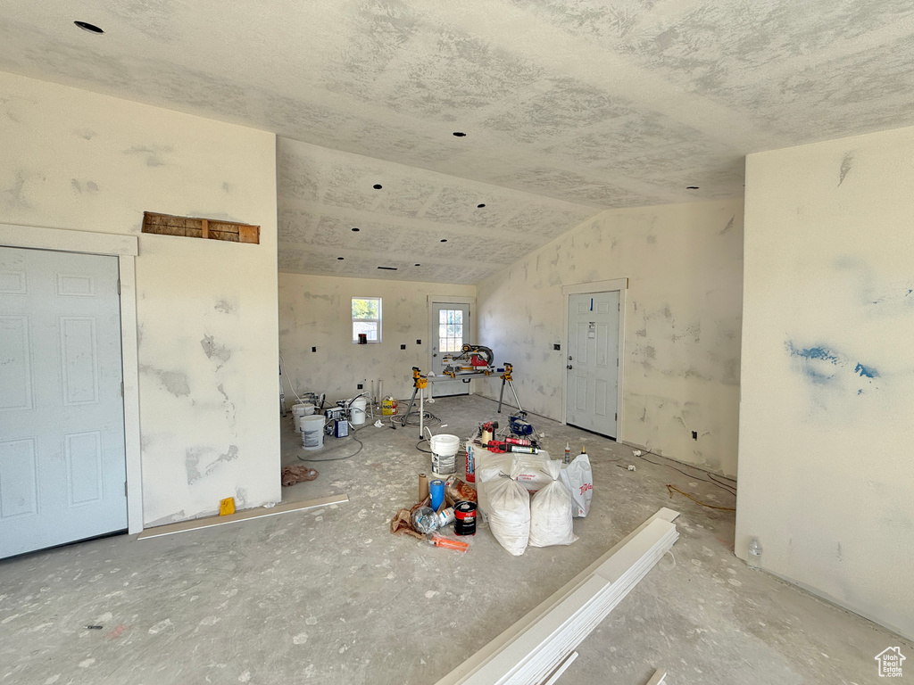 Miscellaneous room featuring vaulted ceiling