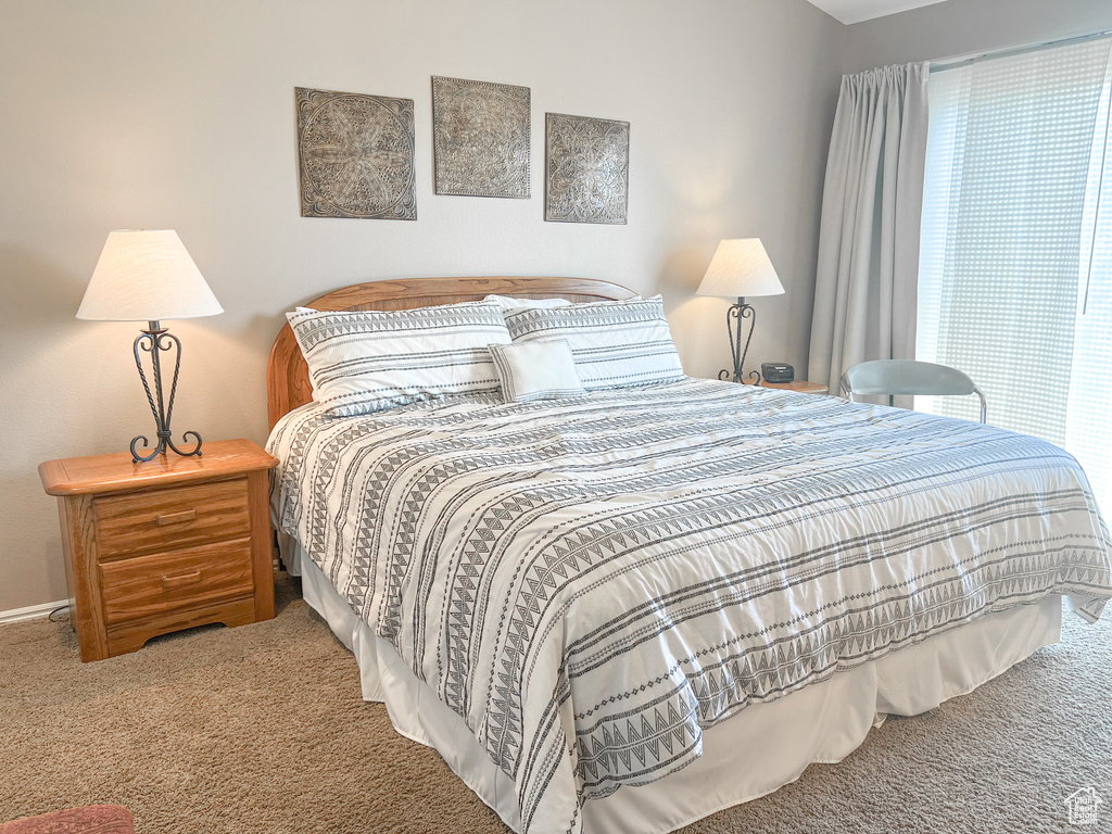 Bedroom with carpet flooring