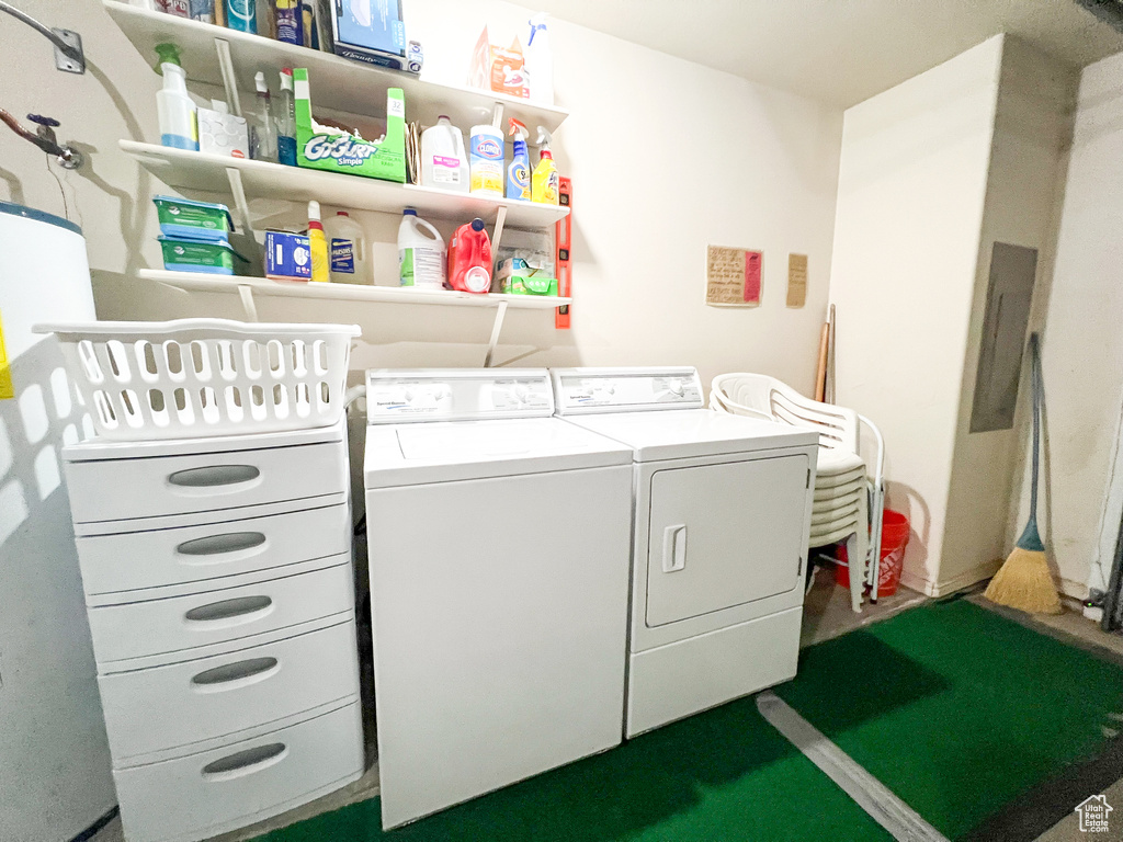 Washroom with washer and clothes dryer