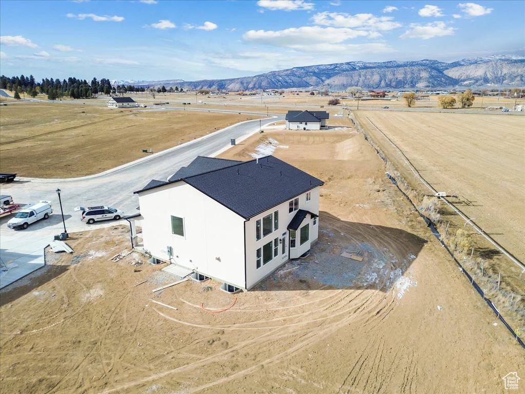 Drone / aerial view featuring a rural view and a mountain view