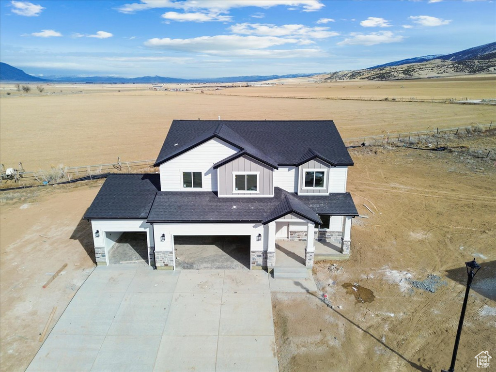 Drone / aerial view featuring a mountain view